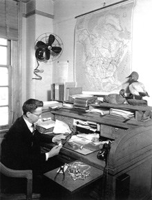 portrait of Frederick C. Lincoln in his office, with stuffed duck.