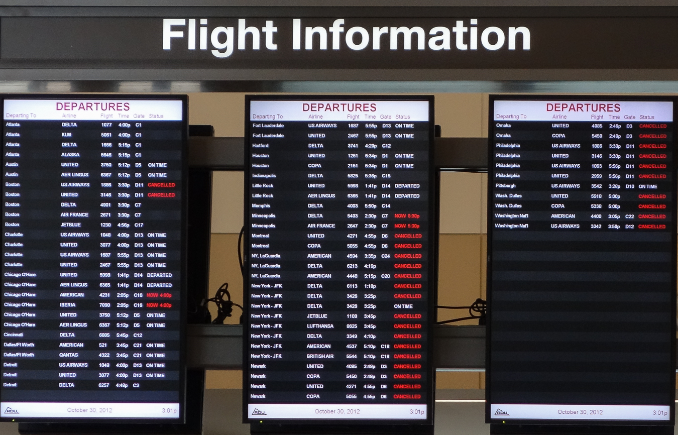 departing-flights display at RDU airport, 3:01 pm, October 30, 2012