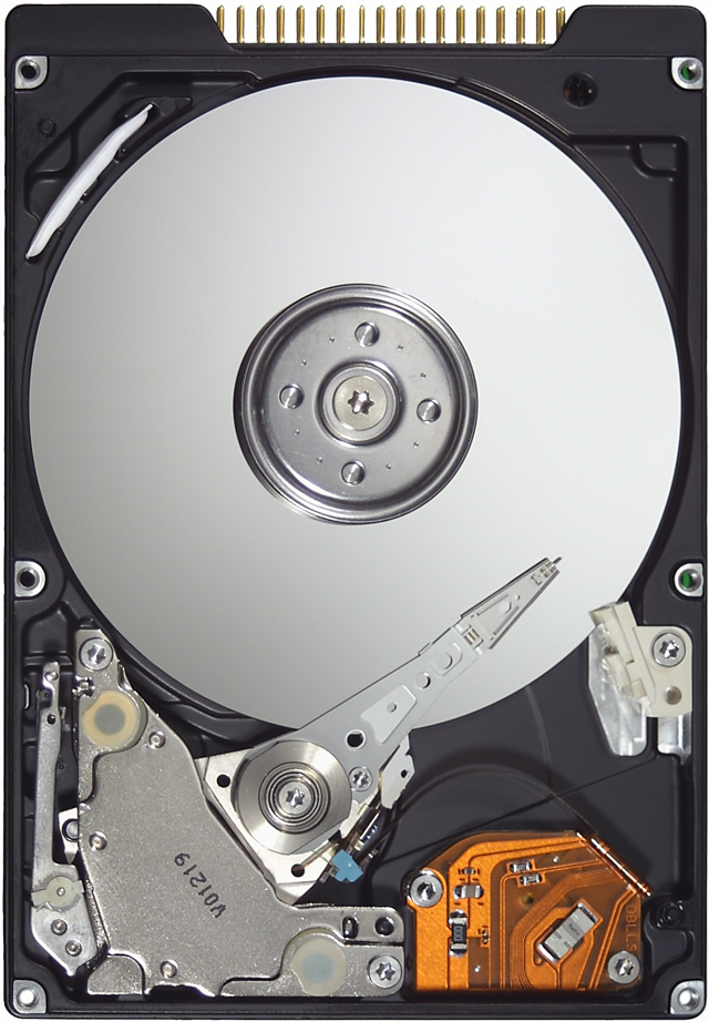 open-case photo of a 15-year-old 2.5-inch disk drive